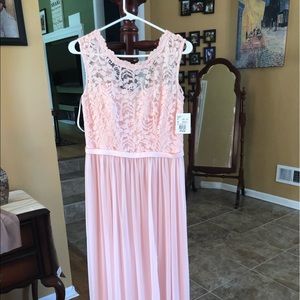 Pastel Pink bridesmaids dress.